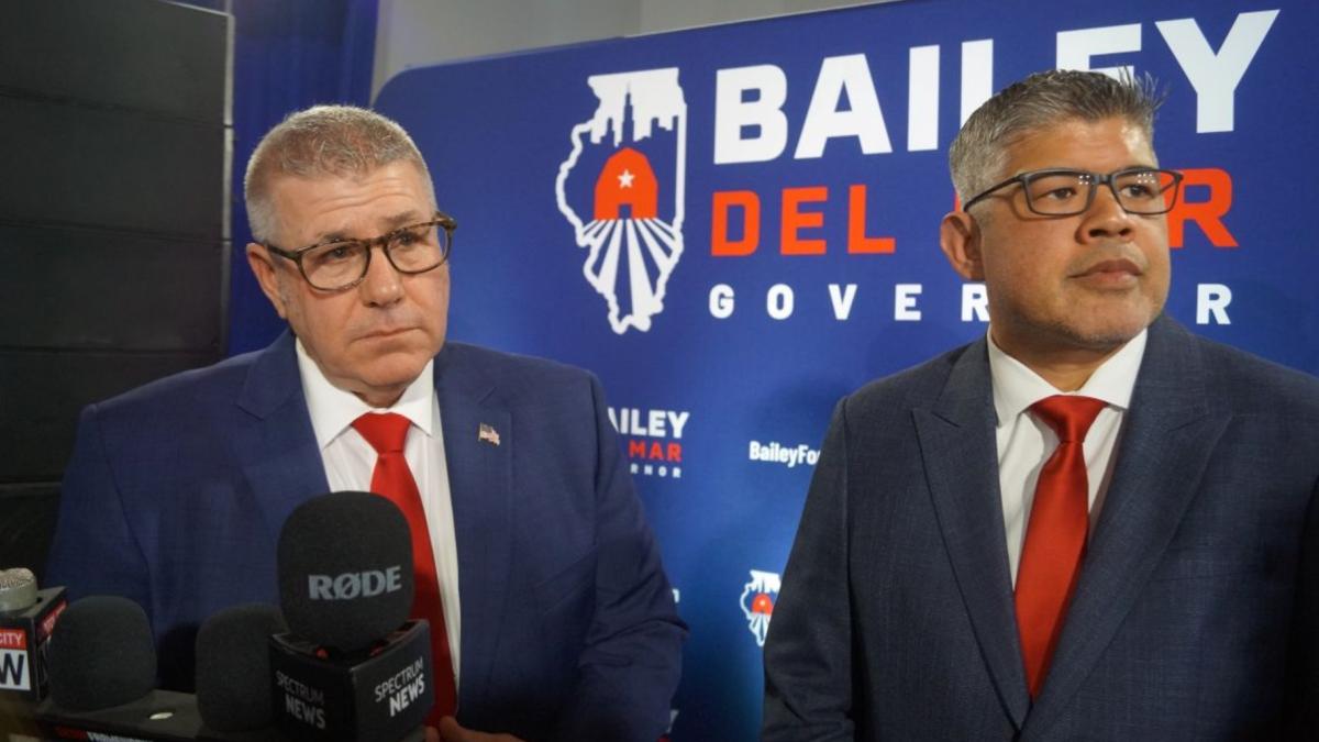 Republican Darren Bailey, left, and his running mate, Aaron Del Mar, take questions from reporters after winning the Republican nomination on primary night on March 17, 2026. (Peter Hancock / Capitol News Illinois)