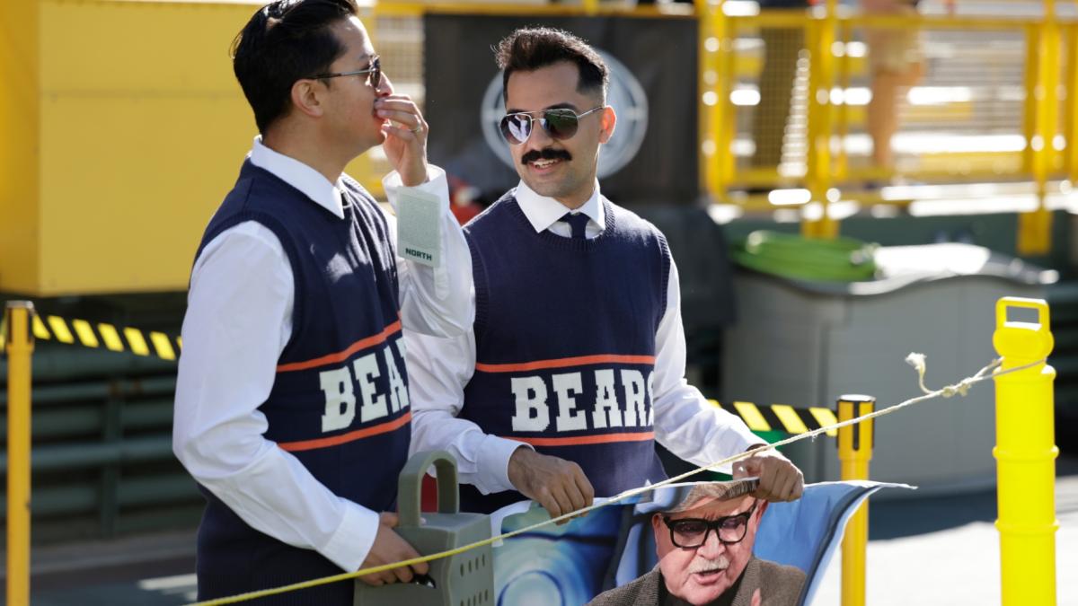 Chicago Bears fans dress up as Mike Ditka before an NFL football game against the Green Bay Packers in Green Bay, Wis., Sunday, Oct. 11, 2026. (AP Photo / Matt Ludtke)