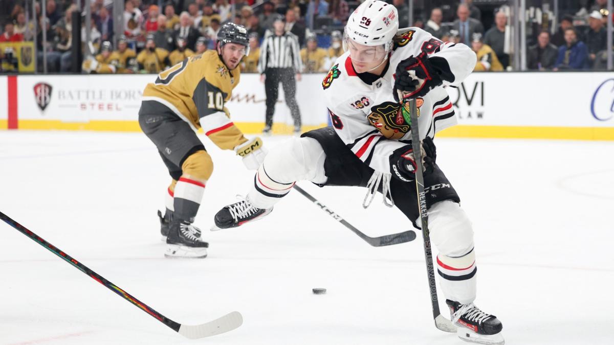Chicago Blackhawks center Connor Bedard (98) passes the puck against the Vegas Golden Knights during the first period of an NHL hockey game Tuesday, Dec. 2, 2025, in Las Vegas. (AP Photo / Ian Maule)