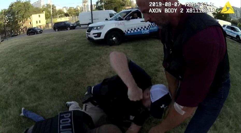 An image captured by a Chicago Police Department officer’s body-worn camera shows Officer Michael Bryant striking an individual during an incident in August 2019. (Civilian Office of Police Accountability)