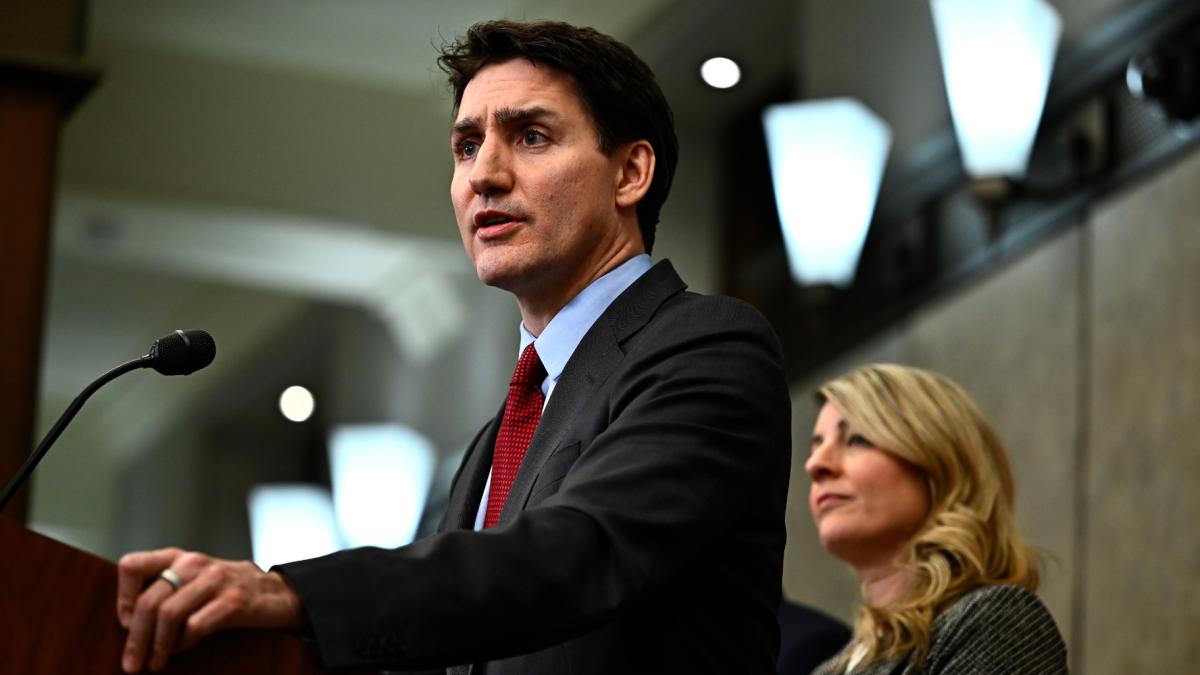 Canadian Prime Minister Justin Trudeau addresses media members after U.S. President Donald Trump signed an order to impose stiff tariffs on imports from Mexico, Canada and China, in Ottawa, Canada, Saturday, Feb. 1, 2025. (Justin Tang/The Canadian Press via AP)