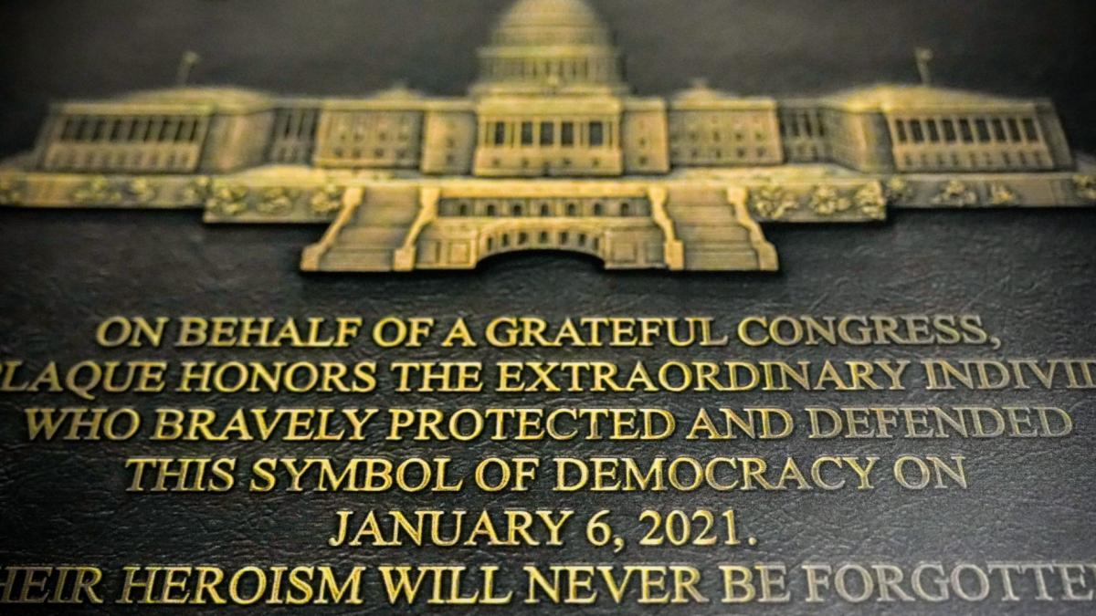 A replica plaque commemorating the Jan. 6, 2021 Capitol riot hangs outside the office of Rep. Zoe Lofgren, D-Calif., Tuesday, Dec. 30, 2025, at the Longworth House Office Building on Capitol Hill in Washington. (AP Photo / Julia Demaree Nikhinson)
