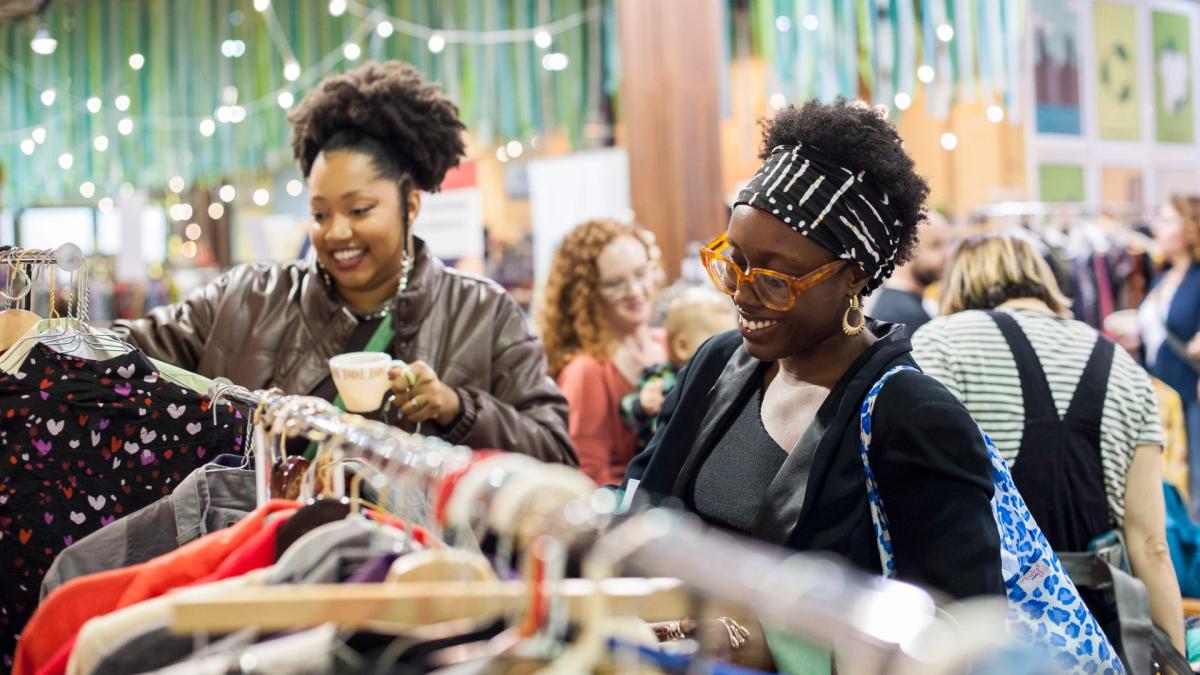 Attendees shop the racks at a previous clothing swap. (Bernadette Aguilar)