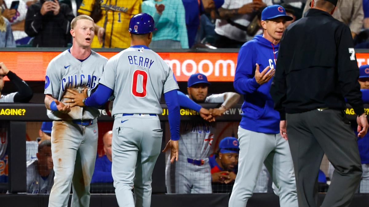 Chicago Cubs' center fielder Pete Crow-Armstrong, left, and manager Craig Counsell, right, argue with umpire Jordan Baker (71) during the seventh inning of a baseball game against the New York Mets, Tuesday, June 23, 2026, in New York. (AP Photo / Noah K. Murray)
