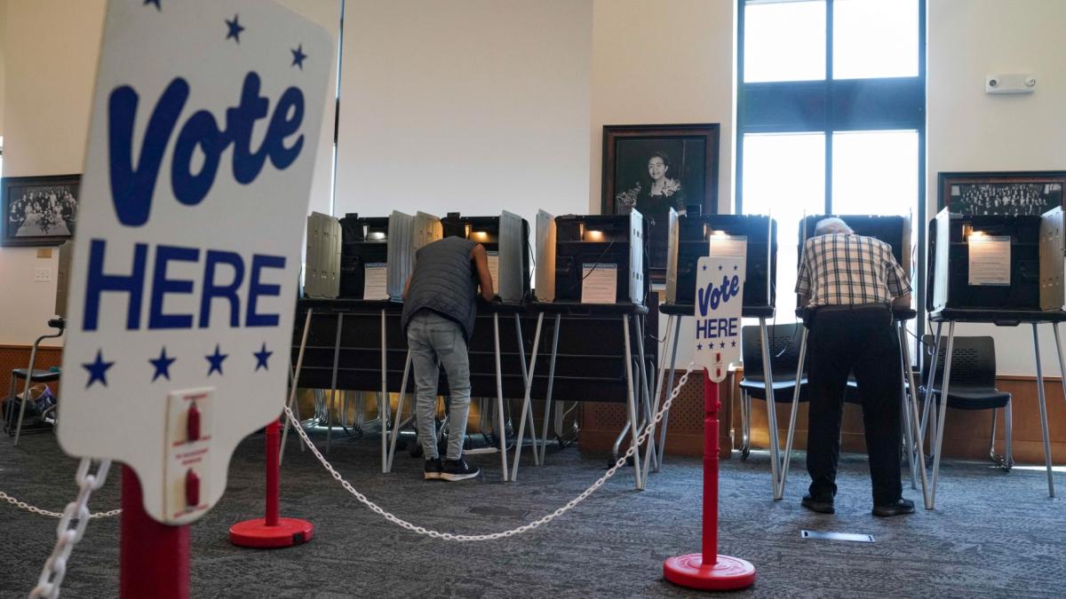 People vote in the Democratic primaries at Blair-Caldwell Library, Tuesday, June 30, 2026, in Denver. (AP Photo / Rebecca Slezak)