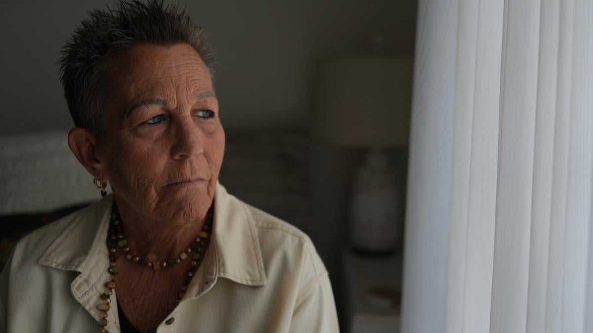 Deb Robertson, a leading advocate for a medical aid-in-dying law named after her in Illinois, pauses during an interview in her home in Lombard, Ill., on Tuesday, Sept. 8, 2026. (AP Photo / Luis Andres Henao)