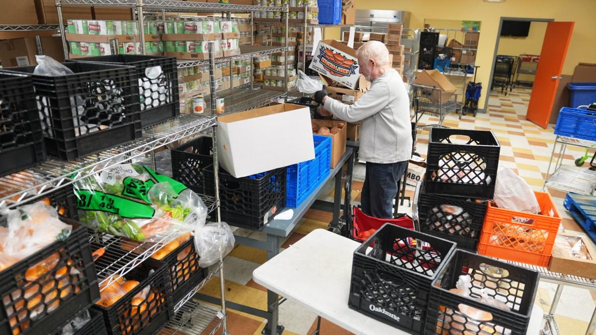 Volunteer Bruce Toben packs groceries durning an emergency food distribution at the at The Jewish Federation of Greater Philadelphia's Mitzvah Food Program in Philadelphia, Friday, Nov. 7, 2025. (AP Photo / Matt Rourke)