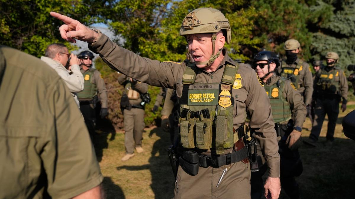 Greg Bovino, the chief patrol agent for the U.S. Border Patrol El Centro sector, center, walks with federal immigration agents near an Immigration and Customs Enforcement facility in Broadview, Ill., Friday, Oct. 3, 2025. (AP Photo / Erin Hooley)