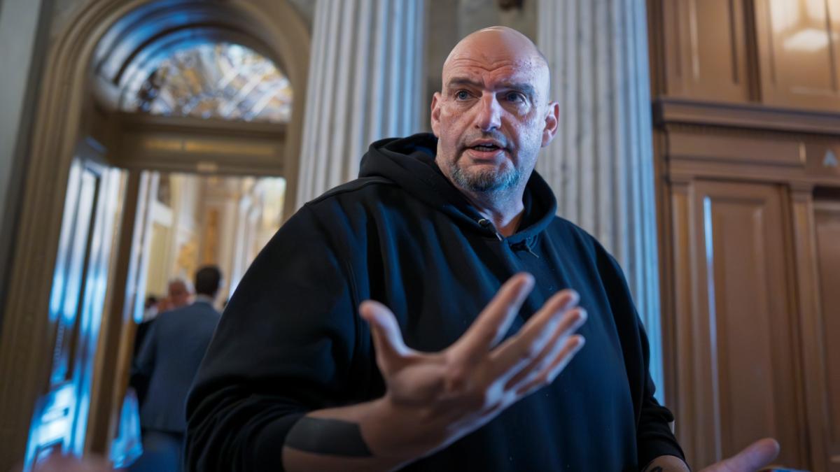  Sen. John Fetterman, D-Pa., talks to reporters outside the chamber during a vote at the Capitol in Washington, March 13, 2025. (AP Photo / J. Scott Applewhite, File)