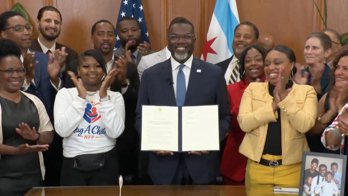 Mayor Brandon Johnson signs an executive order establishing an Office of Gun Violence Reduction on June 25, 2026. (City of Chicago livestream)