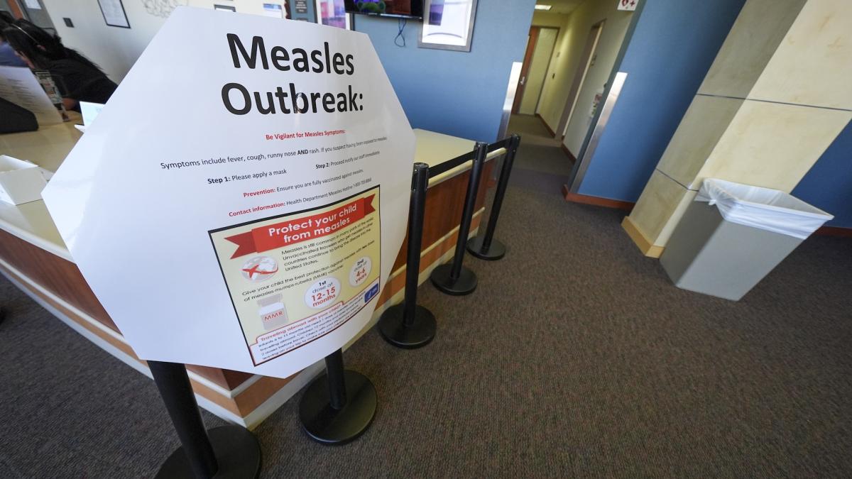 A measles sign is seen at the Texas Tech University Health Sciences Center, Feb. 25, 2025, in Lubbock, Texas. (AP Photo/Julio Cortez, file)