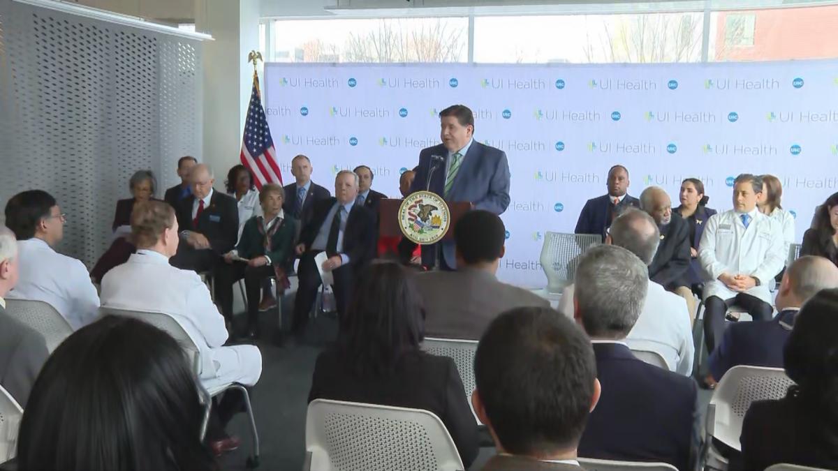 Gov. J.B. Pritzker, joined by members of the state’s Democratic congressional delegation, speaks about potential Medicaid cuts during a news conference at UI Health on the Near West Side on Feb. 28, 2025. (WTTW News)