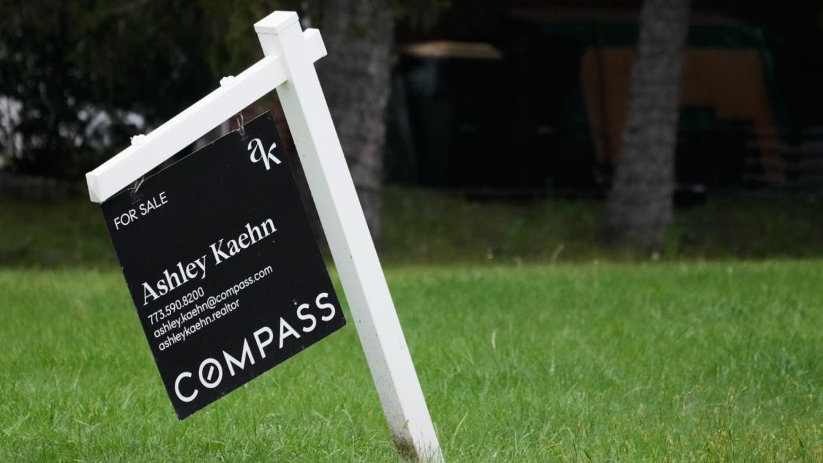 For sale sign is seen outside of a home in Arlington Heights, Ill., Wednesday, Sept. 16, 2026. (AP Photo / Nam Y. Huh)