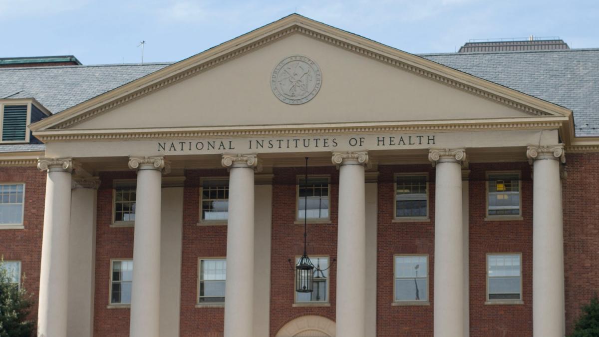 FILE - The National Institutes of Health's James Shannon building is seen on the agency's campus in Bethesda, Md., Friday, Oct. 24, 2014. (AP Photo / Pablo Martinez Monsivais, File)