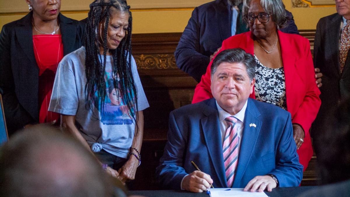 Gov. JB Pritzker signs Senate Bill 1953 into law on Tuesday, Aug. 12, 2025. (Jerry Nowicki / Capitol News Illinois)