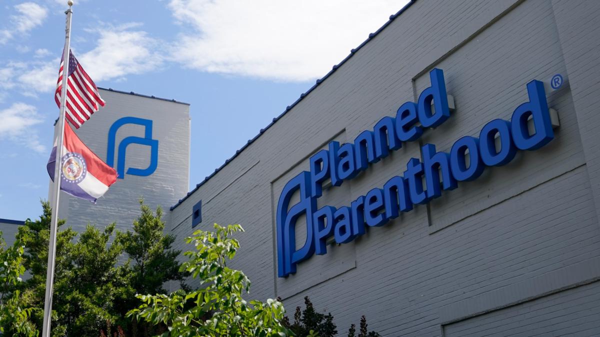 FILE - A Missouri and American flag fly outside Planned Parenthood in St. Louis, June 24, 2022. (AP Photo / Jeff Roberson, File)