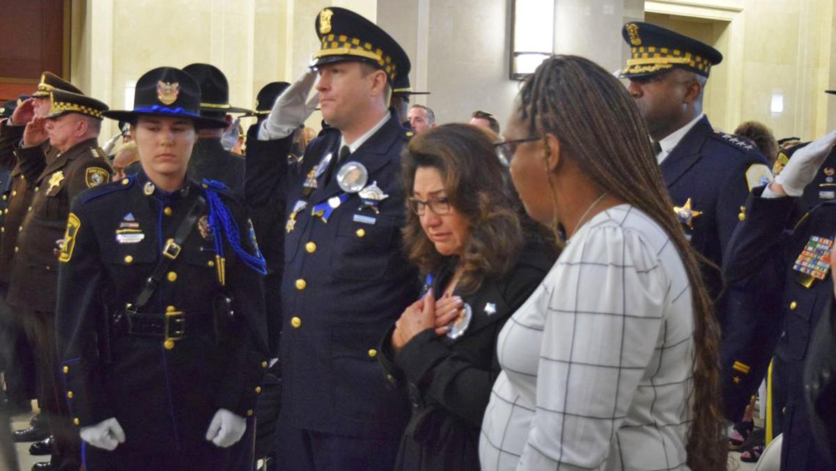 The mother of Chicago Police Officer Luis Huesca mourns her son at the Illinois Peace Officers Memorial Ceremony at the Illinois State Library in Springfield on Thursday, May 1, 2025. (Jade Aubrey / Capitol News Illinois)