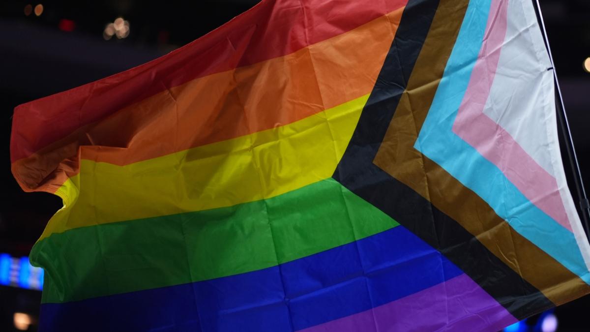FILE - A pride flag is waved during an NBA basketball game in Philadelphia on Sunday, March 30, 2025. (AP Photo / Matt Slocum, File)