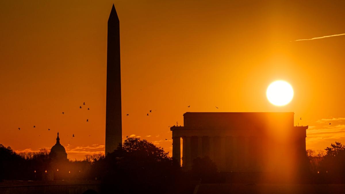 The sun rises above the Lincoln Memorial with the Washington Monument and the U.S. Capitol in the background, March 13, 2021, in Washington. (AP Photo / J. David Ake, File)