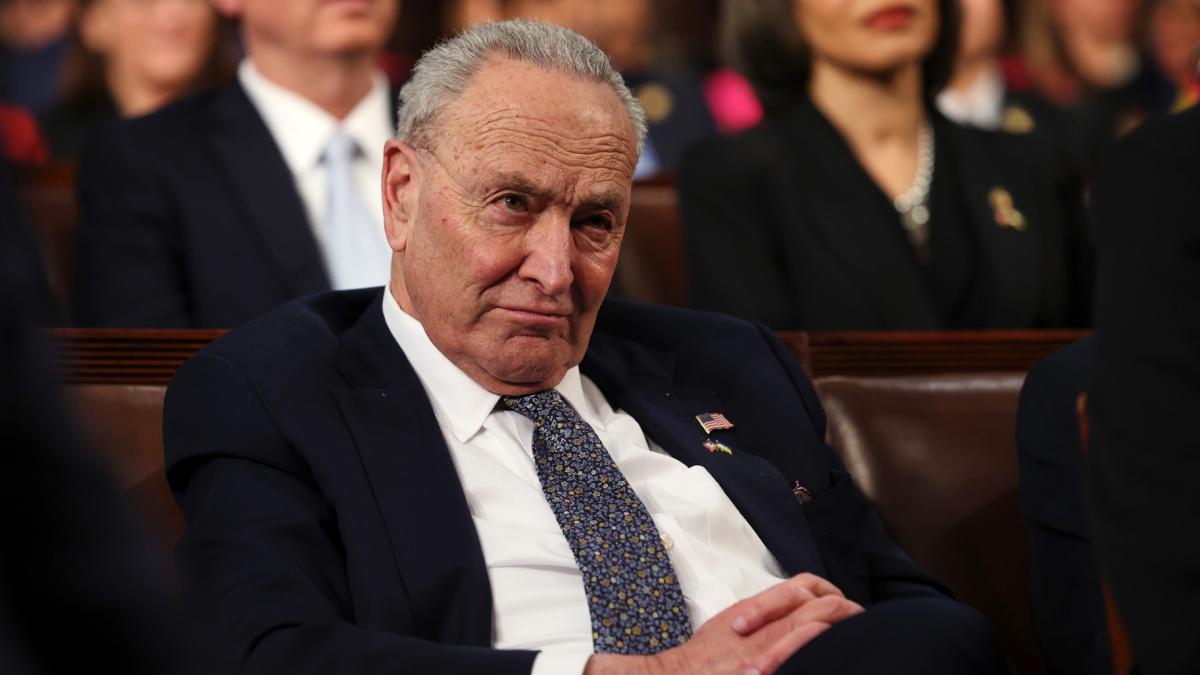 Senate Minority Leader Chuck Schumer, D-N.Y., listens as President Donald Trump addresses a joint session of Congress at the Capitol in Washington, Tuesday, March 4, 2025. (Win McNamee / Pool Photo via AP)