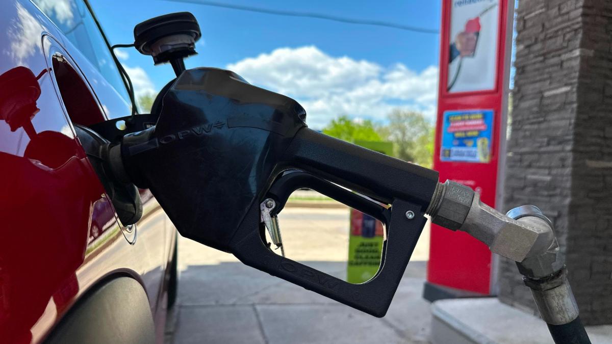 A pump fills up the tank of a vehicle at an Exxon gasoline station in Litttleton, Colo., Tuesday, May 12, 2026. (AP Photo / David Zalubowski)