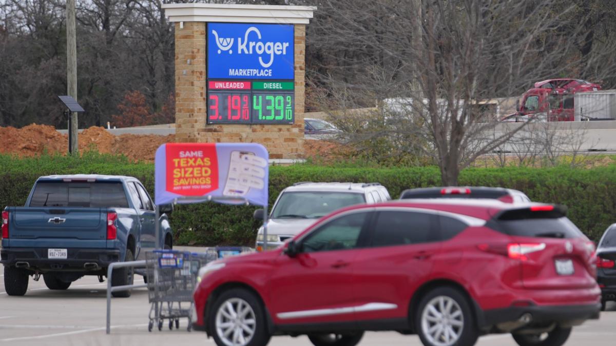 Gas prices are visible on a marquee outside of a Kroger grocery store Monday, March 9, 2026, in Arlington, Texas. (AP Photo / Julio Cortez)