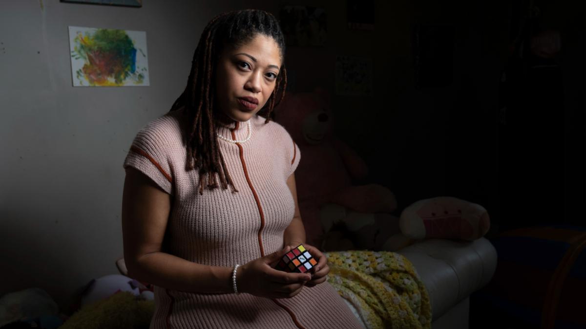 Natasha Nelson, who was diagnosed with autism in August 2023, just after her youngest daughter was also diagnosed, sits in a sensory room she uses to calm her children in her Stone Mountain, Ga. home on Friday, Feb. 14, 2025. (Ben Gray / AP Photo)