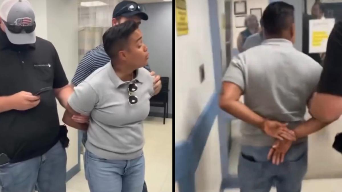 Ald. Jessie Fuentes is put into handcuffs by ICE agents while asking about a warrant for a detained man on Oct. 3, 2025. (Credit: 26th Ward Office)