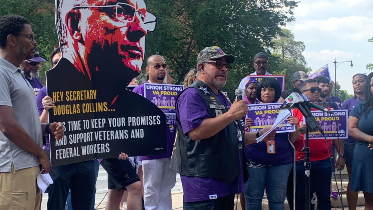 Hines VA motor vehicle operator and U.S. Army veteran Henry Vega speaks during a rally across from the Jesse Brown VA Medical Center on the Near West Side on Aug. 15, 2025. (Eunice Alpasan / WTTW News)