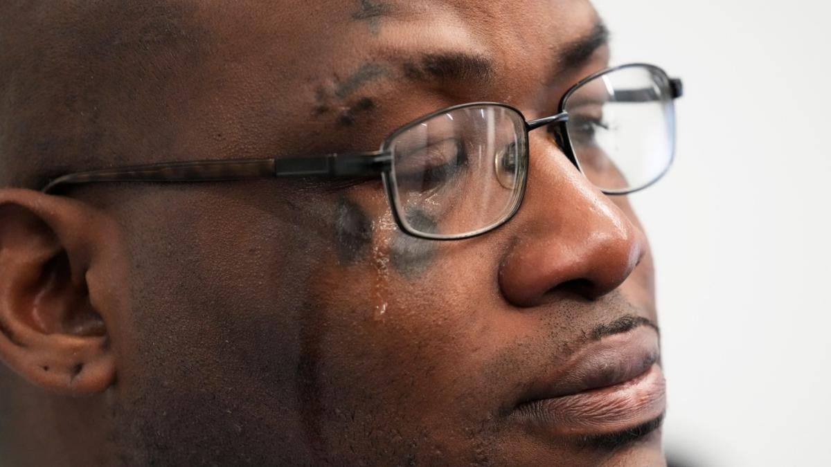 Sexual assault survivor Marcus Walker cries as he listens to Attorney Jerome Block, speak during a news conference in Chicago, Tuesday, Feb. 11, 2025. (AP Photo / Nam Y. Huh)