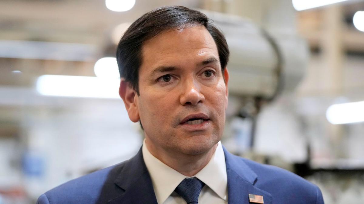 Secretary of State Marco Rubio speaks to the media during a visit to aircraft maintenance firm Aeroman in San Luis Talpa, El Salvador, Monday, Feb. 3, 2025. (Mark Schiefelbein / AP via CNN Newsource)