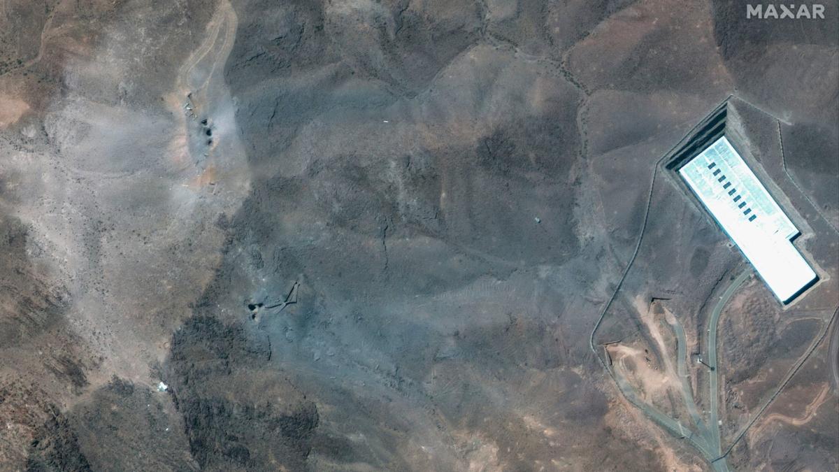 This satellite image provided by Maxar Technologies shows a closer view of craters and ash on a ridge at Fordow enrichment facility in Iran after U.S. strikes, Sunday, June 22. (Maxar Technologies / AP via CNN Newsource)