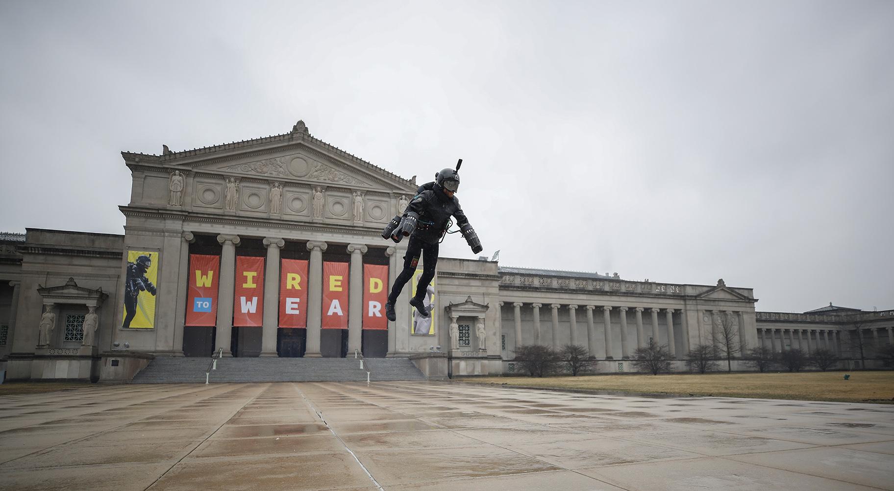 Richard Browning of Gravity Industries demonstrates his Jet Suit as he takes off from the steps of the Museum of Science and Industry in Chicago. (Courtesy of MSI Chicago) 