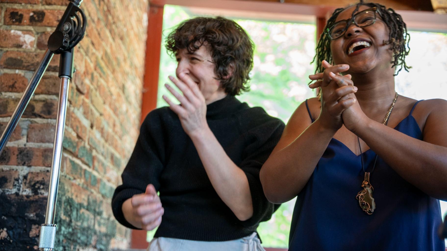 Sarah Conway and Trina Reynolds-Tyler learn about their Pulitzer Prize win on May 6, 2024. (Efrain Soriano / City Bureau)