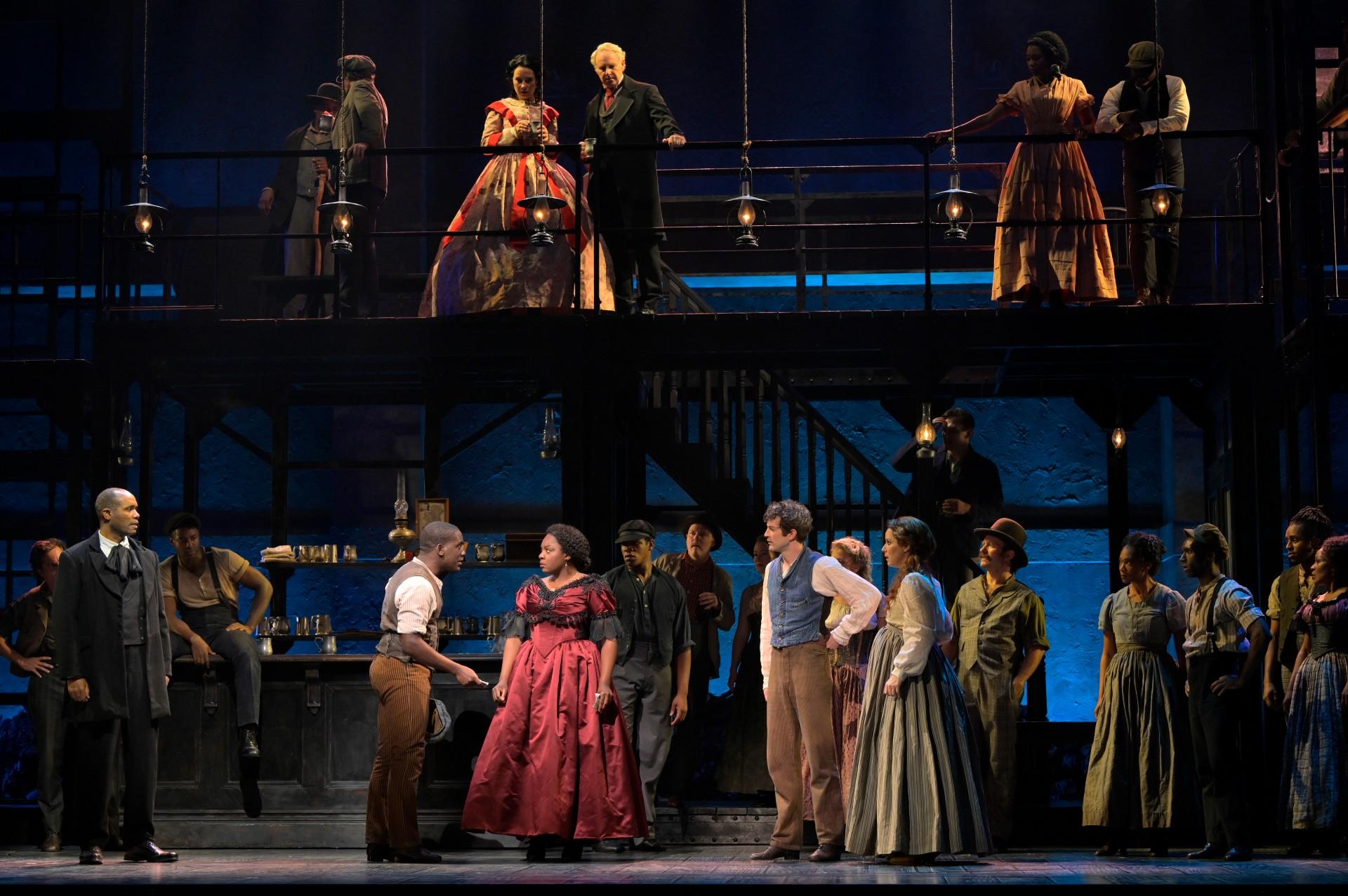 Bottom: Nathaniel Stampley, Sidney DuPont, Joaquina Kalukango, A.J. Shively, Chilina Kennedy; Top center: Erica Spyres and John Dossett and Ensemble in “Paradise Square.” ( © Kevin Berne)