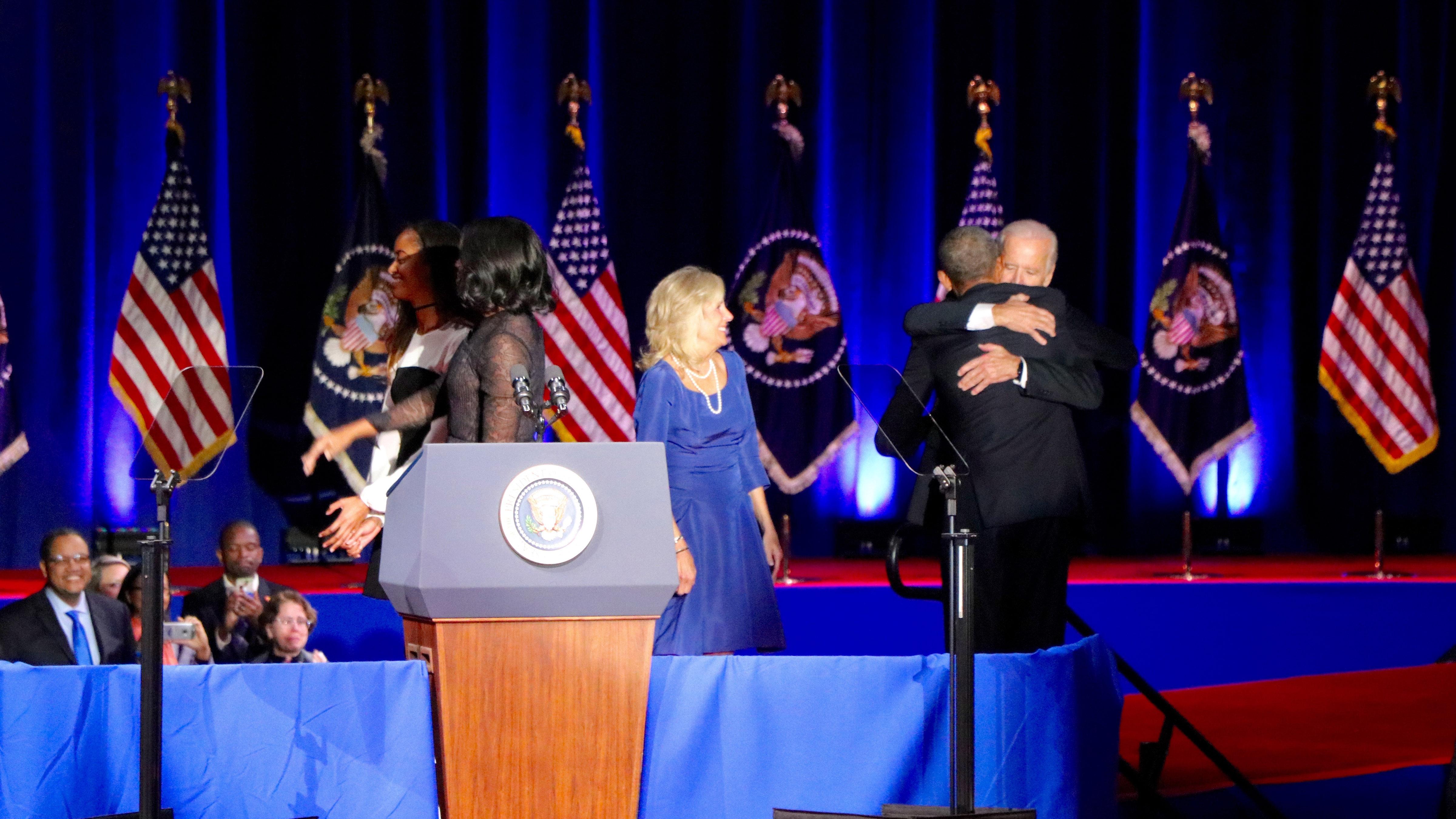 The president and vice president embrace onstage. (Evan Garcia / Chicago Tonight)