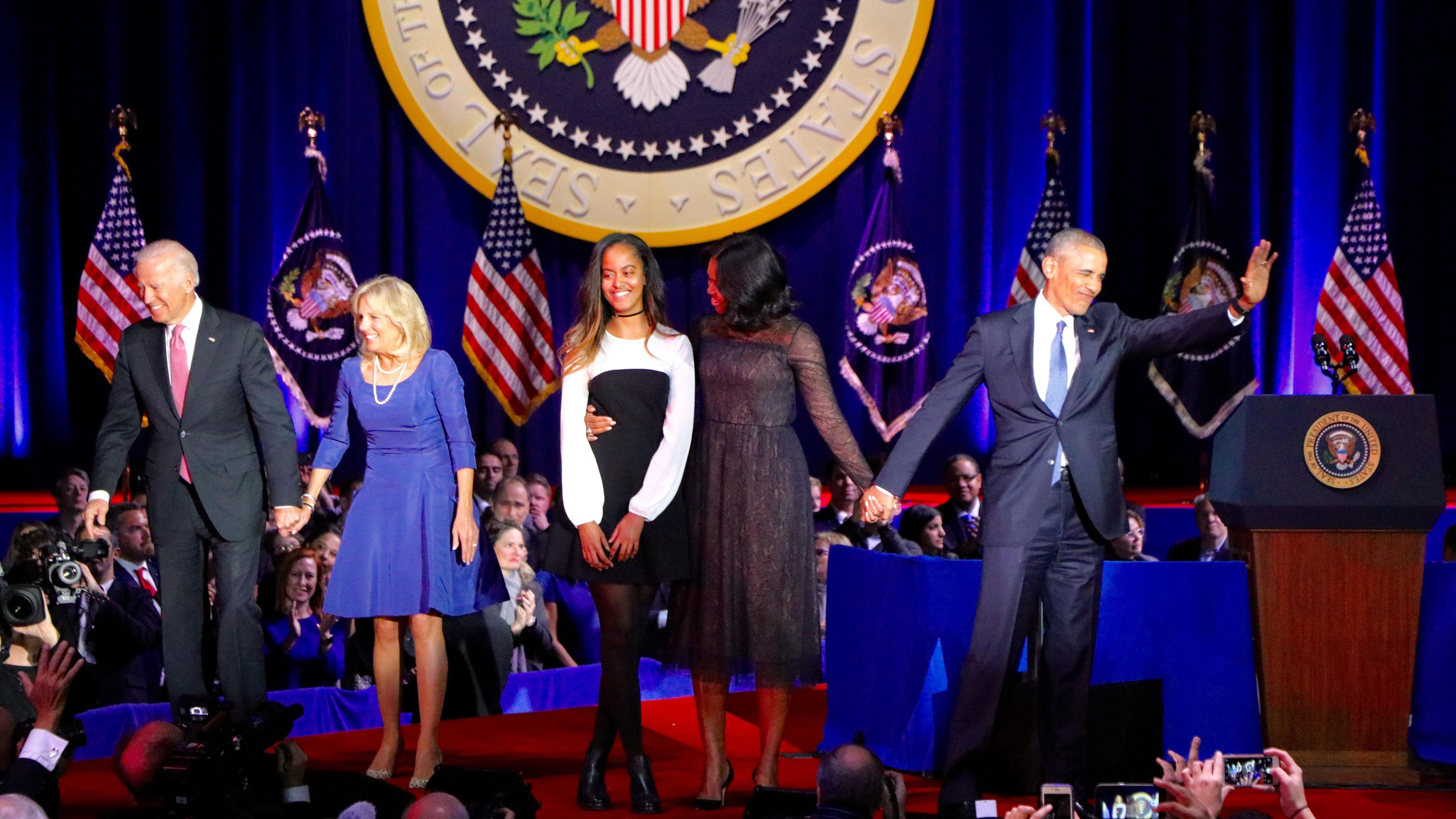 Vice President Joe Biden, Dr. Jill Biden, Malia Obama, First Lady Michelle Obama and President Barack Obama wave to the crowd at McCormick Place on Tuesday night. (Evan Garcia / Chicago Tonight)