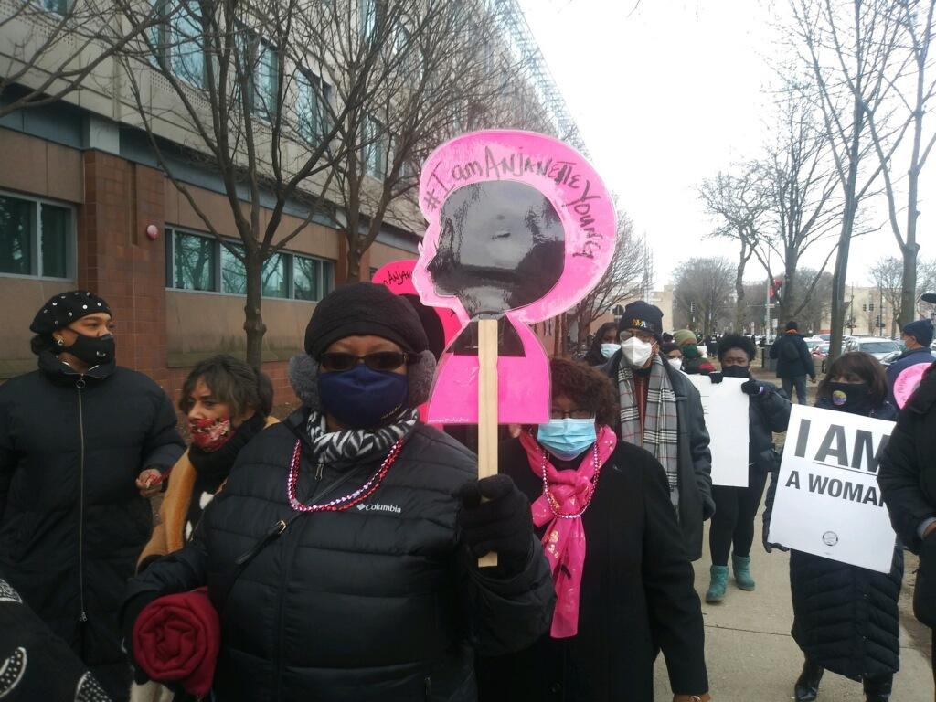 Protesters march outside police headquarters in Chicago on Sunday, Dec. 27, 2020. (Annemarie Mannion / WTTW News)