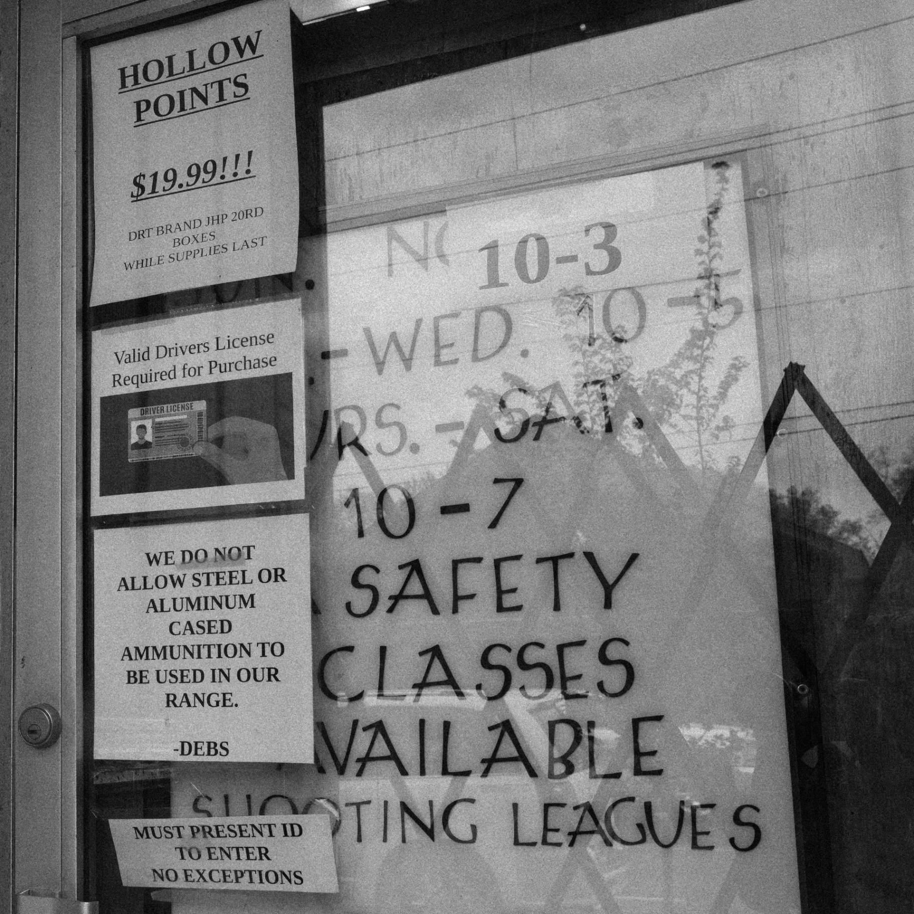 Signage is posted for customers entering Deb’s Gun Range. (Sarahbeth Maney / ProPublica)