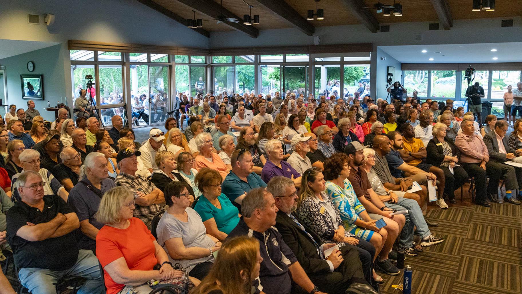 The crowd at a public forum hosted by the Illinois Commerce Commission is pictured in Bolingbrook on July 22, 2024. (Andrew Adams / Capitol News Illinois)