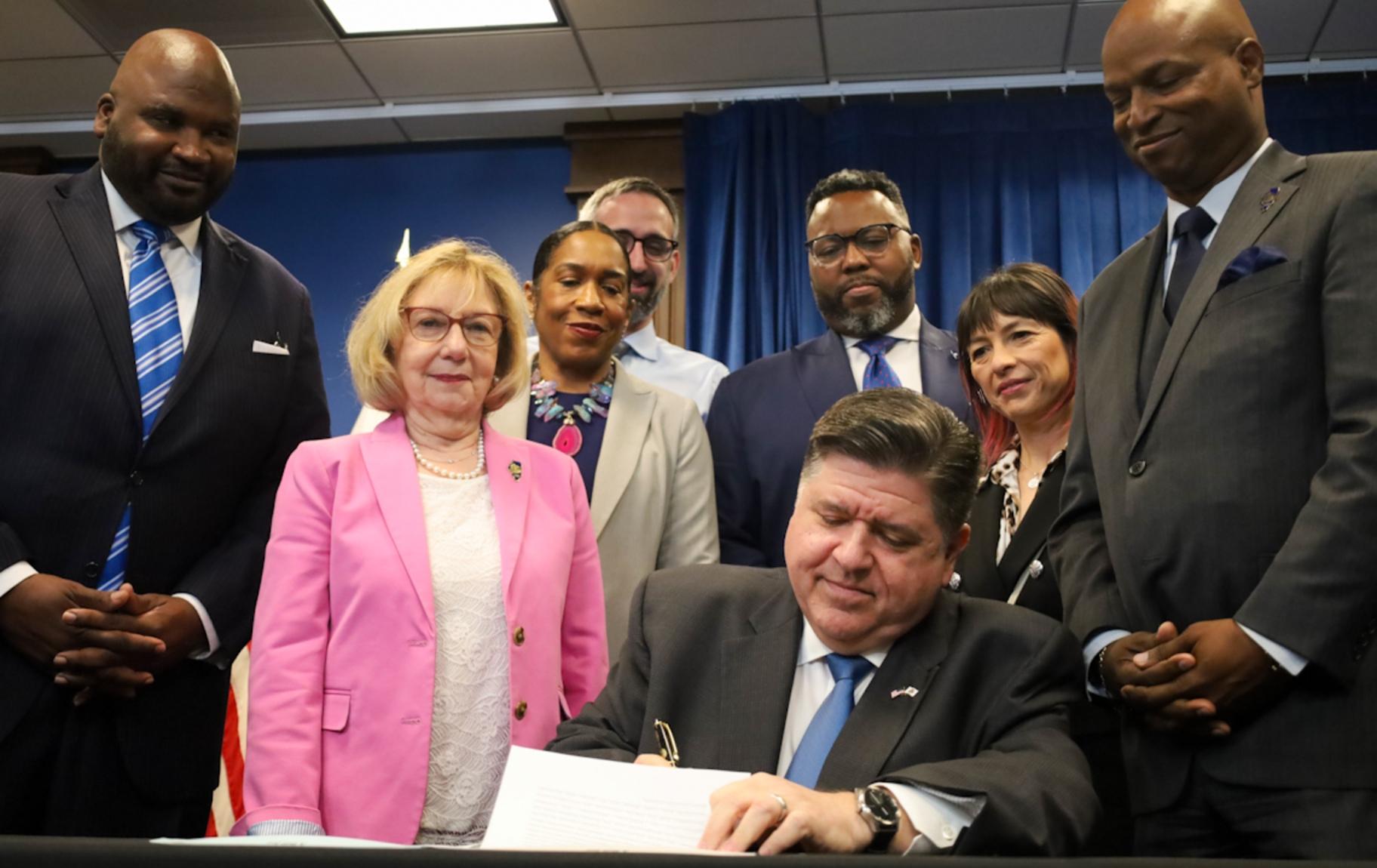 Gov. JB Pritzker signs Illinois’ fiscal year 2026 budget on June 16, 2025, outlining $55.1 billion in state spending. (Andrew Adams / Capitol News Illinois)