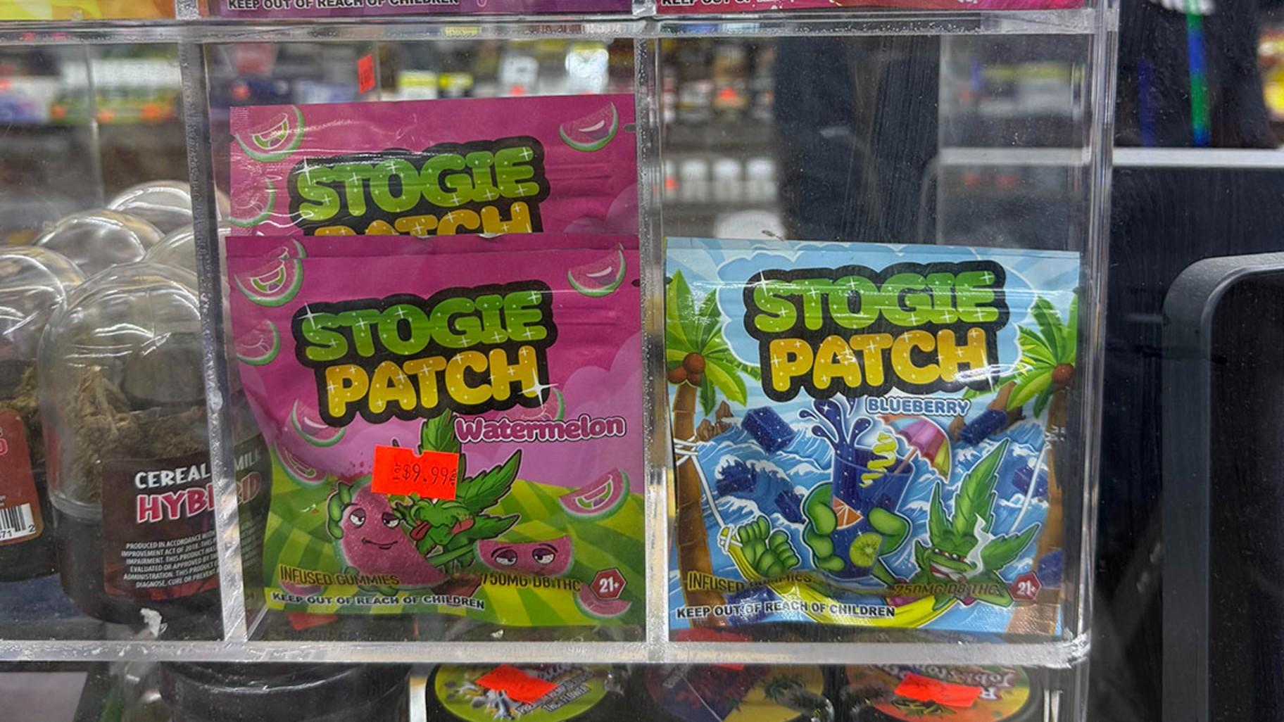 In many convenience stores that sell hemp, the products are behind the counter, even though it’s not illegal to sell hemp products to minors. These packages are also labeled “21+” and “keep out of reach of children.” Critics say the design, modeled after Sour Patch Kids, is intentionally designed to appeal to children. (Simon Carr / Medill Illinois News Bureau)
