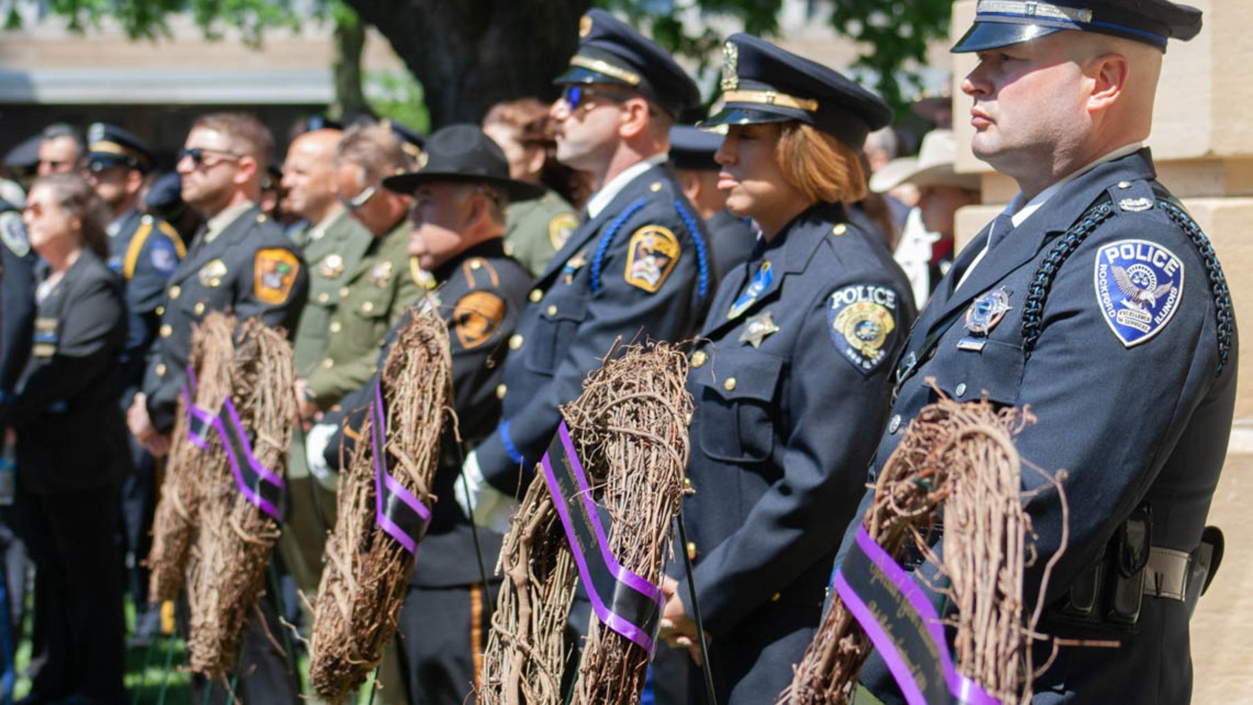 Officers place wreaths at the Illinois State Police Memorial in Springfield on May 7, 2026. (Jenna Schweikert / Capitol News Illinois)