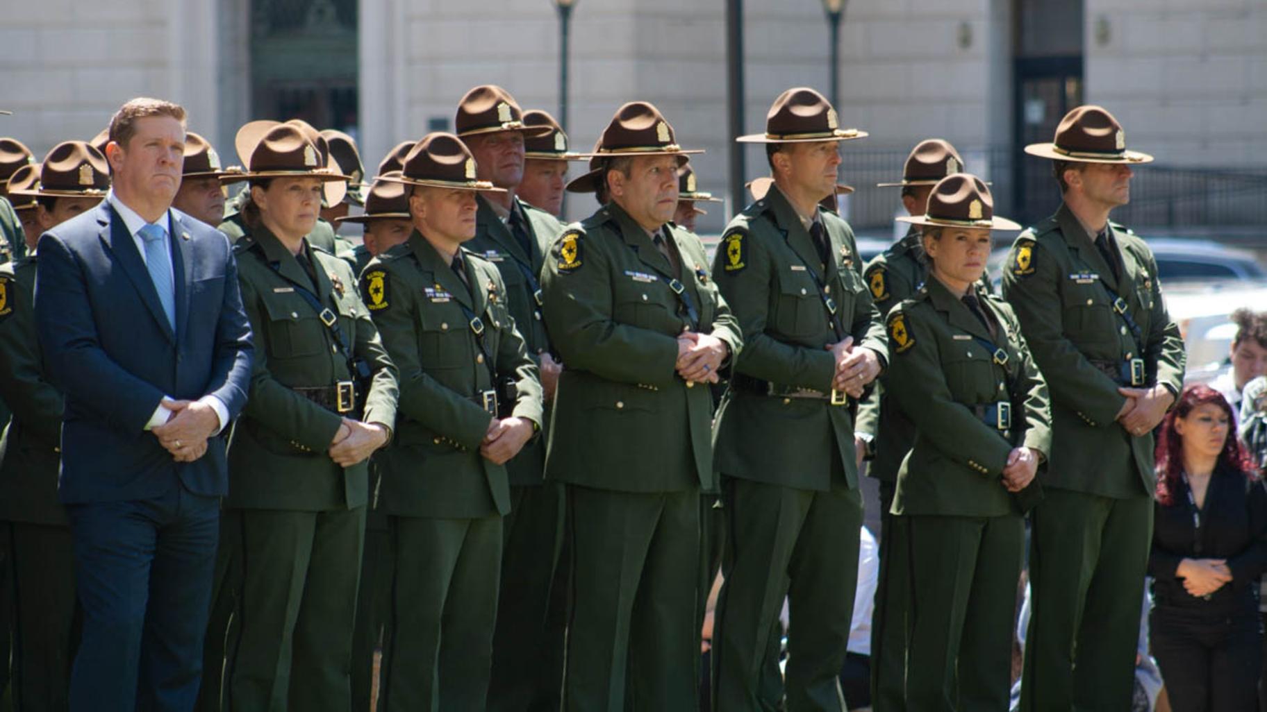 Illinois State Police officers stand in formation during an annual ceremony honoring fallen Illinois law enforcement officers. The May 7, 2026, ceremony honored a Chicago police officer and Park Forest detective who died while on duty in 2025. (Jenna Schweikert / Capitol News Illinois)