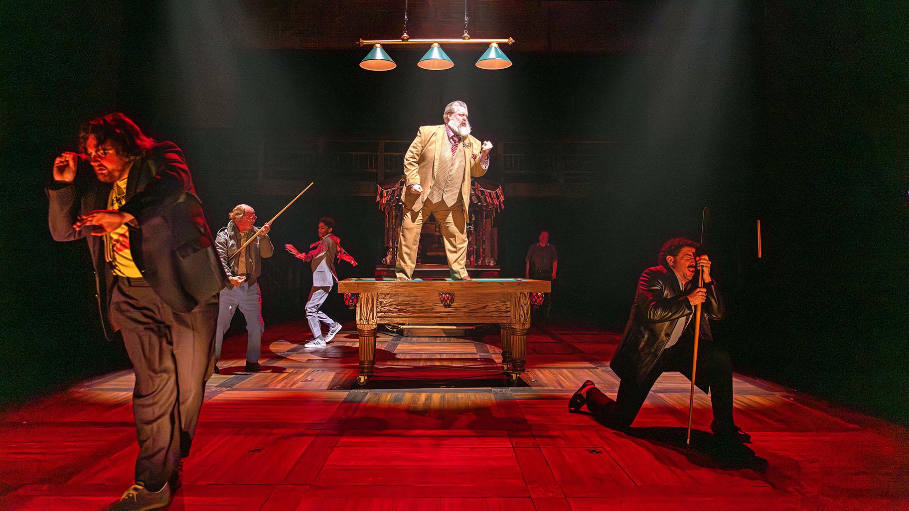 Shakespeare’s most raucous comedy, “The Merry Wives of Windsor,” comes to life at Chicago Shakespeare Theater, featuring Jason Simoon as Falstaff (center), along with Teddy Gales (Bardolph), Zach Bloomfield (Nym), Rohan Rhys Degala (Robin Page), Bret Tuomi (Host of the Garter Inn) and Colin Huerta (Pistol). Directed by Phillip Breen, running in the Courtyard Theater, April 2-May 3, 2026. (Kyle Flubacker)