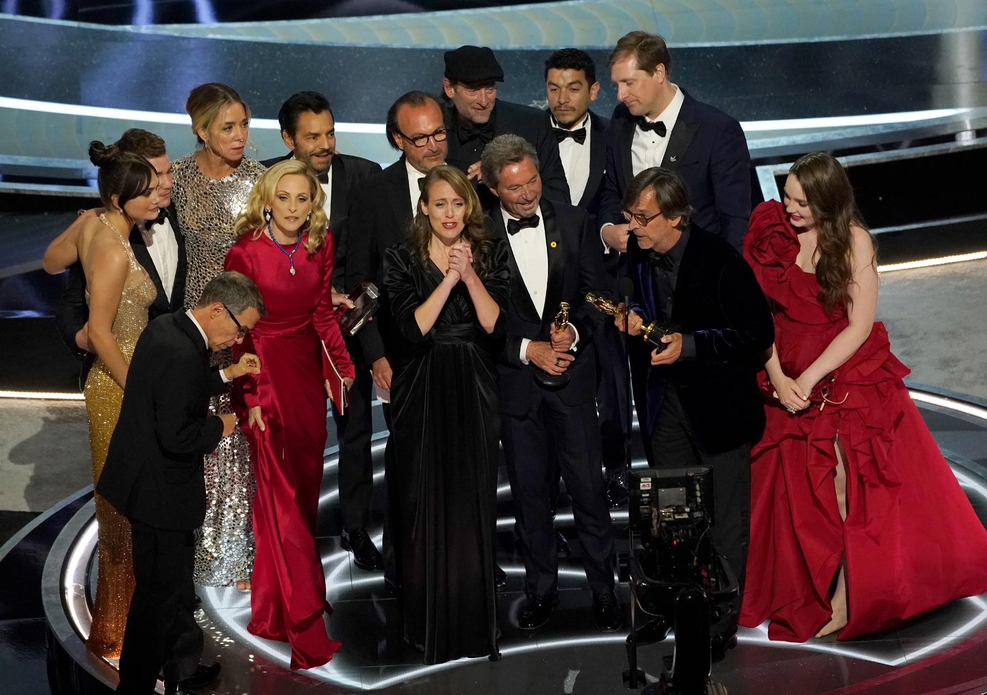 The cast and crew of “CODA” accept the award for best picture at the Oscars on Sunday, March 27, 2022, at the Dolby Theatre in Los Angeles. (AP Photo / Chris Pizzello)