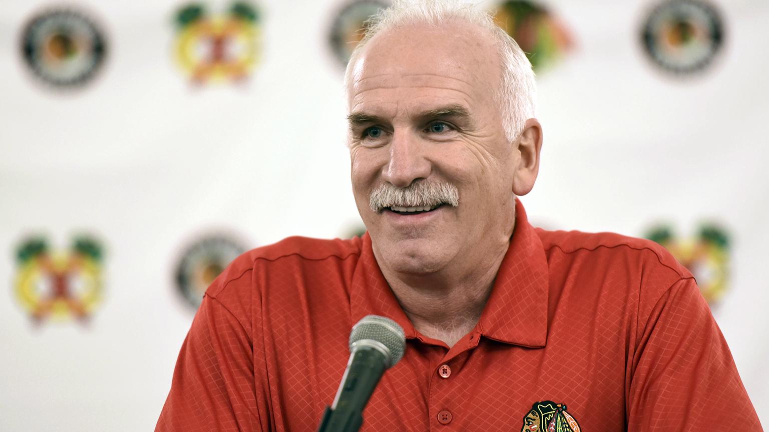 Chicago Blackhawks’ head coach Joel Quenneville speaks at a news conference July 21, 2017, during the NHL hockey team’s convention in Chicago. (G-Jun Yam / AP File Photo)