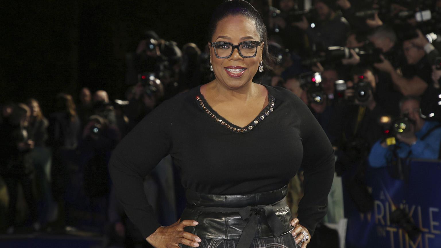 In this March 13, 2018, file photo, actress Oprah Winfrey poses for photographers upon arrival at the premiere of the film “A Wrinkle In Time” in London. (Photo by Joel C Ryan / Invision / AP File Photo)