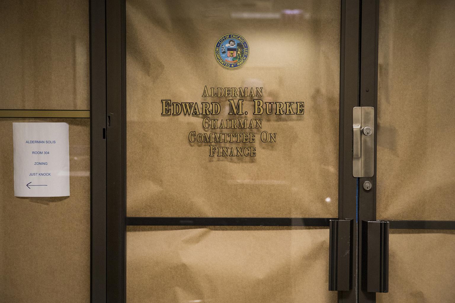 Brown paper covers the windows of Ald. Edward Burke’s office at Chicago City Hall on Thursday morning, Nov. 29, 2018. (Ashlee Rezin / Chicago Sun-Times via AP)