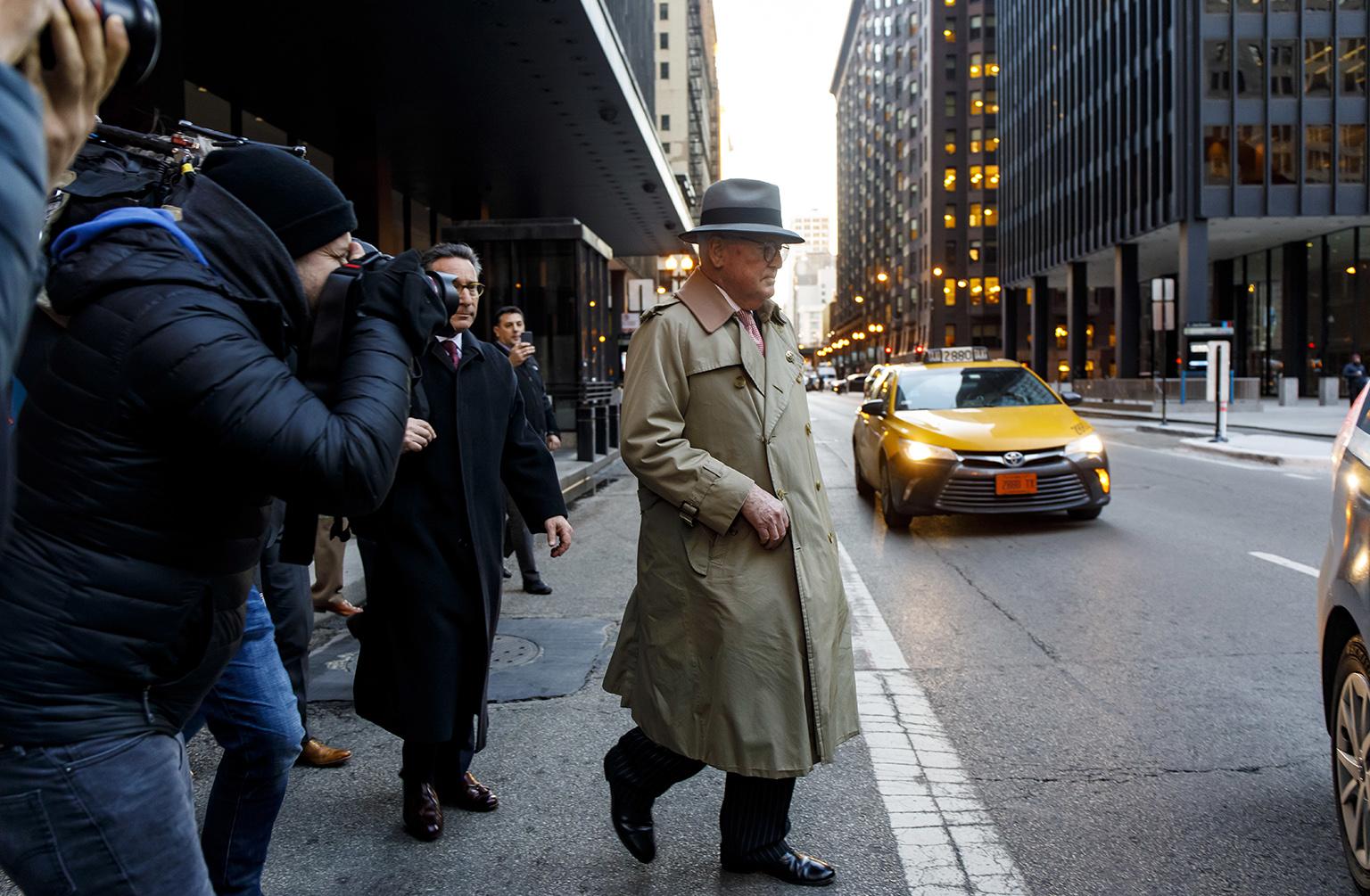 Ald. Ed Burke, 75, walks out of the Dirksen Federal Courthouse following his release after turning himself in on Thursday, Jan. 3, 2019. (Brian Cassella / Chicago Tribune via AP)